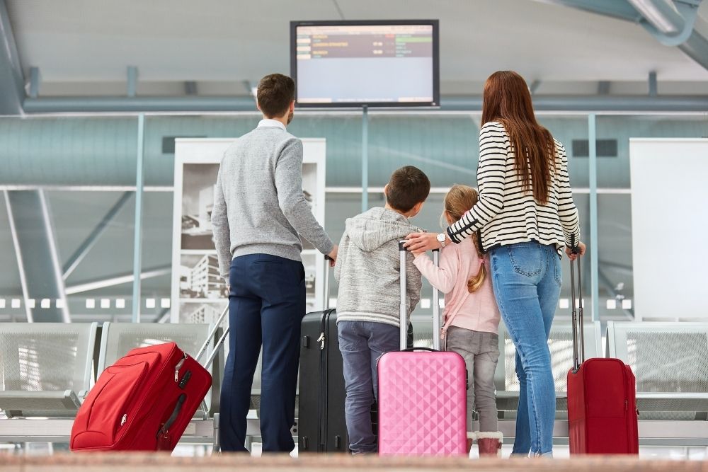 International Relocations with Personnel Relocations - family at airport