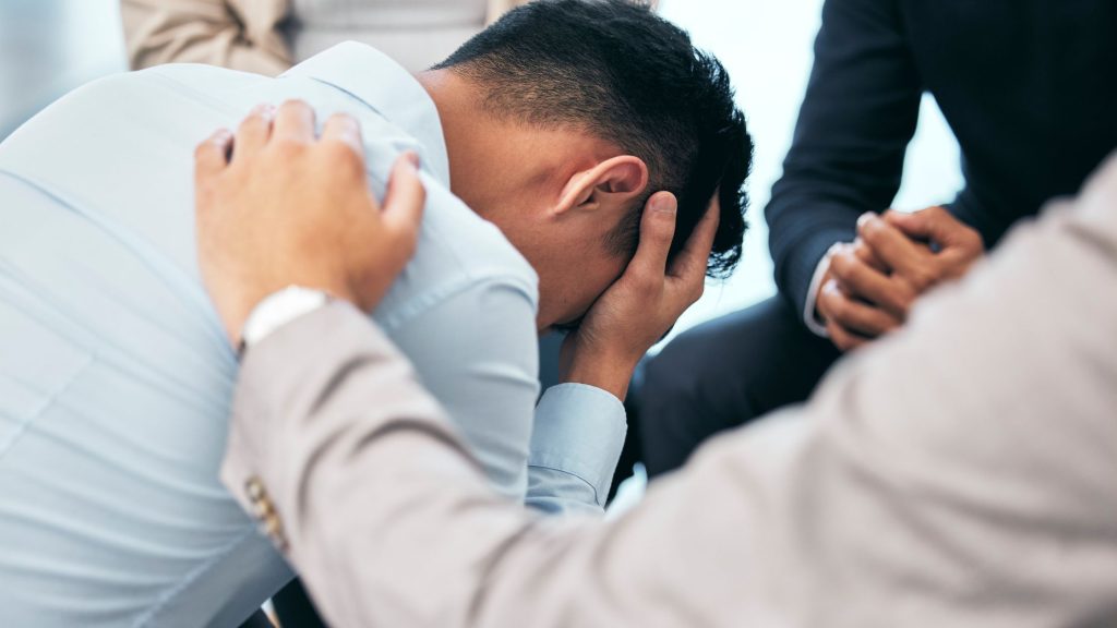 Man stressed at workplace